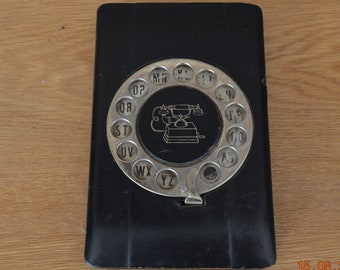 Vintage telephone directory and perpetual calendar