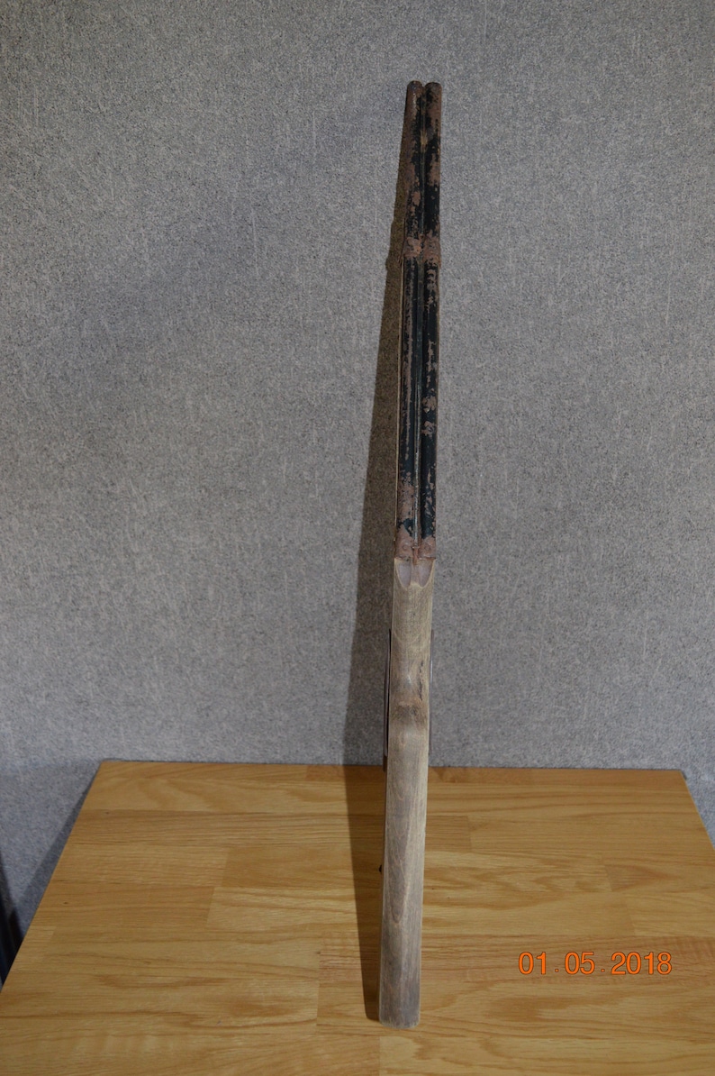 Old wooden rifle for children