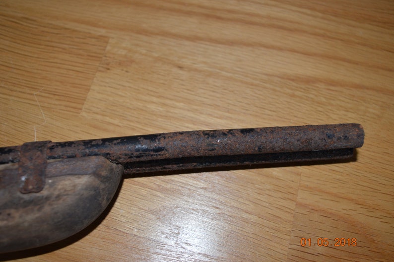 Old wooden rifle for children