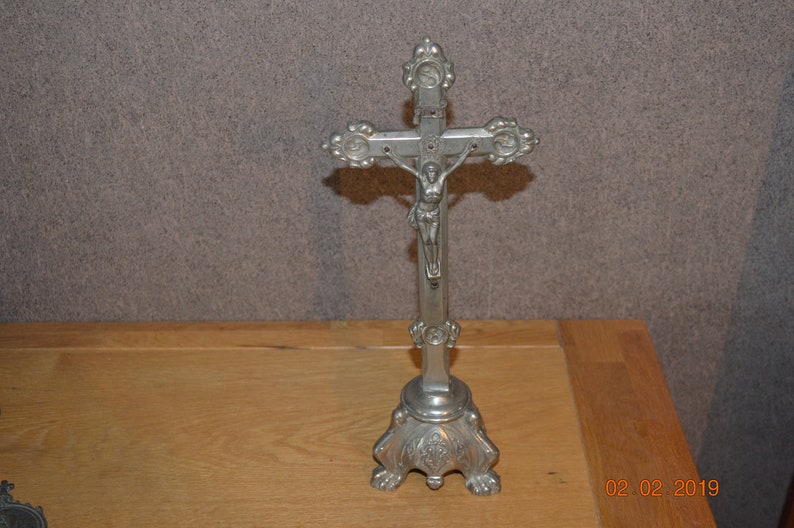 Silver metal crucifix image 1