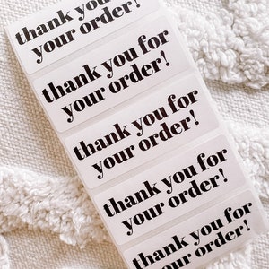 May include: Five white stickers with black text that reads "thank you for your order!"