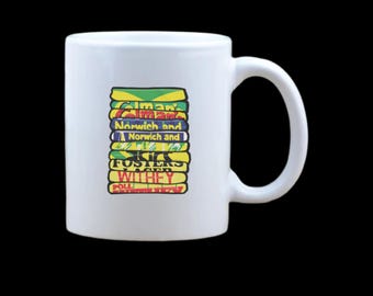 Caneca com as camisas antigas do Norwich City FC