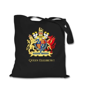 May include: Black tote bag with a gold, red, and blue royal crest and the text "QUEEN ELIZABETH I" in gold. The crest features a lion, unicorn, and dragon. The bag has long straps.