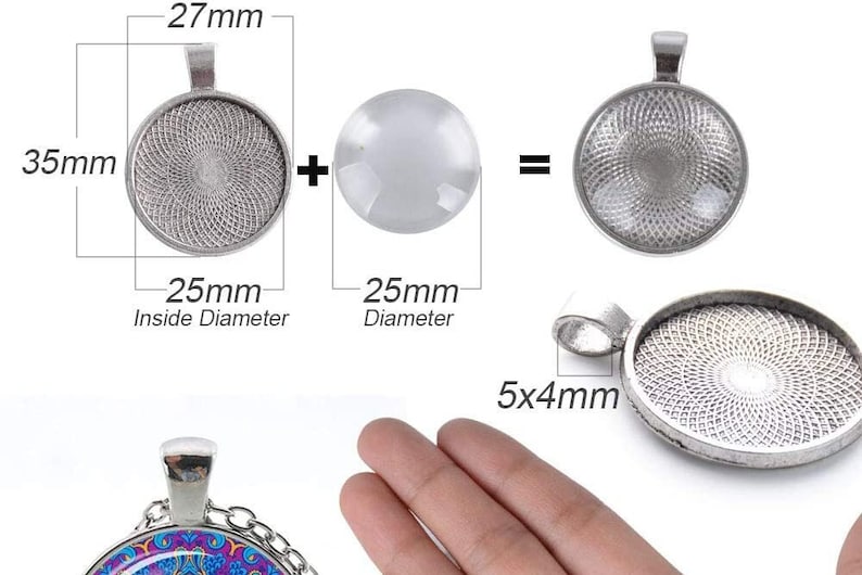 May include: Silver-toned pendant tray with a 25 mm inside diameter and a 27 mm outer diameter. The tray has a decorative pattern and a 5x4 mm loop for attaching a chain. A clear glass cabochon with a 25 mm diameter is shown next to the tray.
