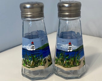Nautical Cape Hatteras Lighthouse Glass Salt and Pepper Shaker Set Figurine with Holder in Decorative Kitchen Decor Sculptures and Collectible Coastal Gifts DWK Corp. Nautical Cape Hatteras Lighthouse Glass Salt and Pepper Shaker Set Figurine with Holder in Decorative Kitchen Decor Sculptures and Collectible Coastal Gifts DWK Corp.