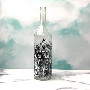 Here is a great way to present olive oil on the table or counter for any time of the year. This lovely design is very sweet and charming with the black/white/gray  floral design.