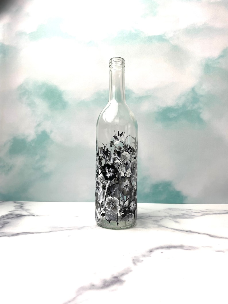 Here is a great way to present olive oil on the table or counter for any time of the year. This lovely design is very sweet and charming with the black/white/gray  floral design.