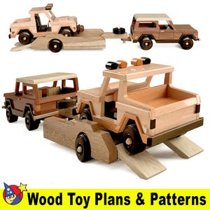 May include: A wooden toy set featuring two brown toy trucks. One truck is hauling the other on a wooden trailer. The trucks have a vintage look and are made of wood.