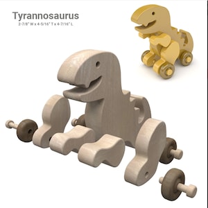 May include: A wooden toy Tyrannosaurus Rex with wheels. The toy is disassembled and the pieces are spread out on a white surface. The toy is 2-7/8 inches wide, 4-5/16 inches tall, and 4-7/16 inches long.