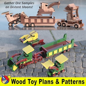 May include: Wooden toy plans and patterns for building a dumper truck, an articulated lorry, and a backhoe. The toys are made of wood and painted in various colours, including green, yellow, red, and brown. The text "Gather Ore Samples on Distant Moons!" is visible at the top of the image.