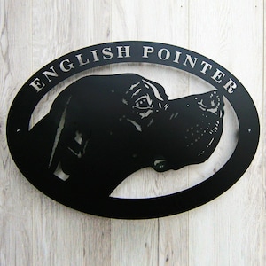 May include: Black metal oval sign with the words "ENGLISH POINTER" in a silver-coloured font. The sign features a silhouette of an English Pointer dog's head.