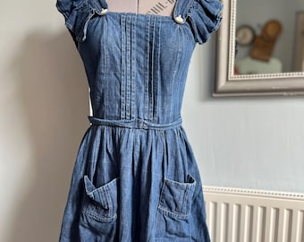 vintage denim overgooier uit de jaren 60 en 70
