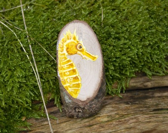 Sea horse painting on a recycled wood slice