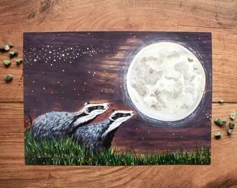 May include: Painting of two badgers looking up at a large, white moon in a dark, starry sky. The badgers are in the foreground, and the moon is in the background. The sky is a dark blue, and the stars are white. The moon is a bright white, and the badgers are a dark brown.