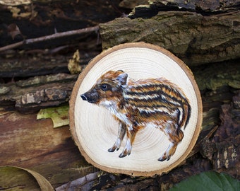 Wild boar piglet painting on a recycled wood slice