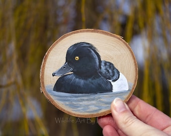 Tufted duck painting on a recycled birch wood slice