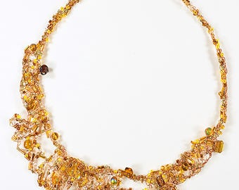 22 inch golden necklace crochet with artist wire, glass beads