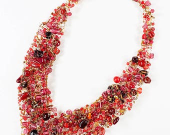 24 inch red necklace hand-knit with artist wire, acrylic and glass beads