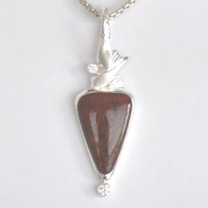 Sterling Silver and Petrified Dinosaur Bone Pendant