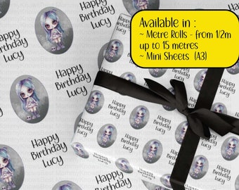 May include: White wrapping paper with a repeating pattern of a cute cartoon girl with purple hair and a black dress. The girl is holding a skull and is standing on a gray moon. The text "Happy Birthday Lucy" is printed in black on each circle. The text "Available in: ~ Metre Rolls - from 1/2m up to 15 metres ~ Mini Sheets (A3)" is printed in yellow on a black background.