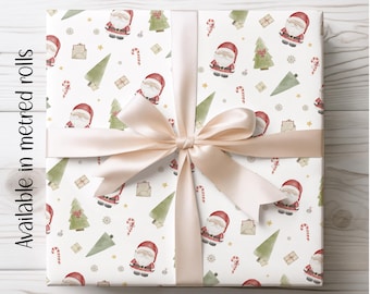 May include: Christmas-themed wrapping paper featuring Santa Claus, Christmas trees, candy canes, and gifts on a white background. The paper is tied with a light peach satin ribbon. Text on the side reads "Available in metred rolls."