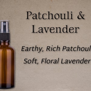 May include: A brown glass bottle with a black spray nozzle filled with essential oil blend. The label reads "Patchouli & Lavender" and describes the scent as "Earthy, Rich Patchouli Soft, Floral Lavender".