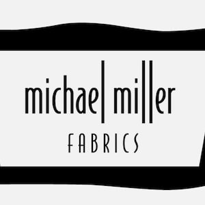 May include: Black and white logo with the text "michael miller FABRICS" inside a black, wavy, rectangular frame.