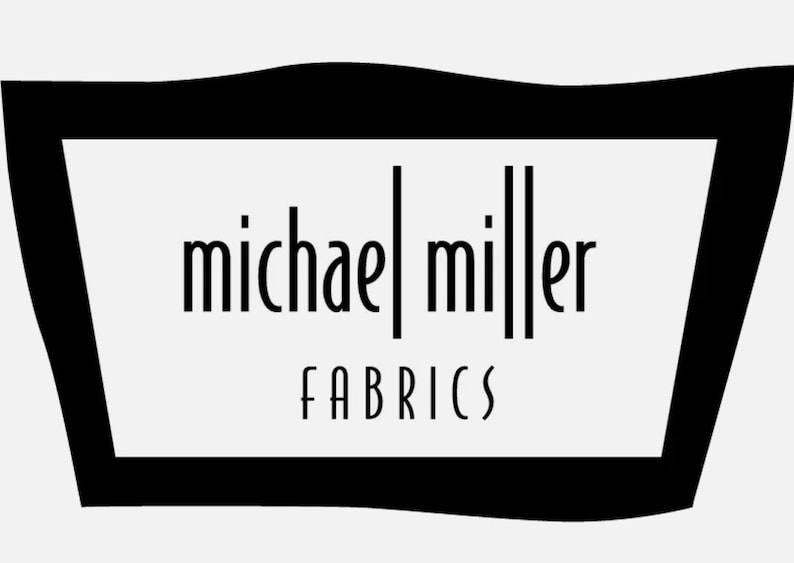May include: Black and white logo with the text "michael miller FABRICS" inside a black, wavy, rectangular frame.