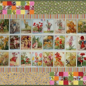 May include: A colorful quilt featuring a patchwork design with a central panel of alphabet cards depicting fairies and flowers. The cards are surrounded by a border of green, yellow, and red squares with a repeating pattern of letters.