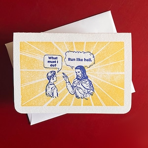 Cartão de felicitações impresso em tipografia Run Like Hell.