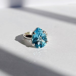 Sterling silver pear shape blue topaz ring