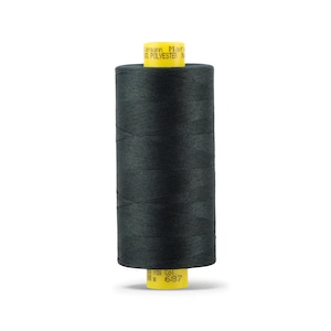 May include: A spool of dark green thread with a yellow label that reads "Gütermann Mara 100% Polyester Made in Germany" and "169 yds Col. 687".