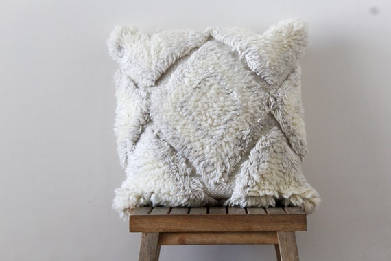 white shaggy cushions