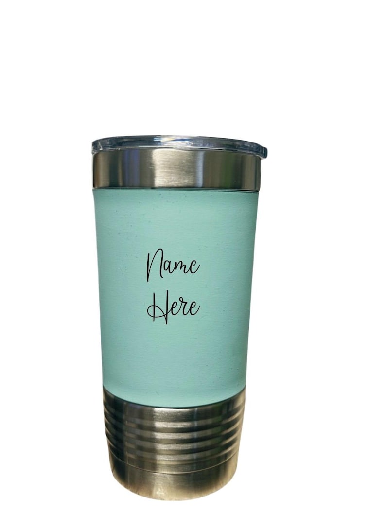 May include: A light blue stainless steel tumbler with a silver lid and base. The tumbler has the text "Name Here" printed on the side.