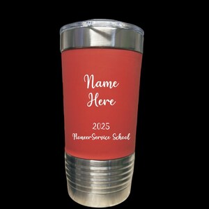 May include: A red stainless steel tumbler with a white inscription that reads "Name Here 2025 Pioneer Service School".