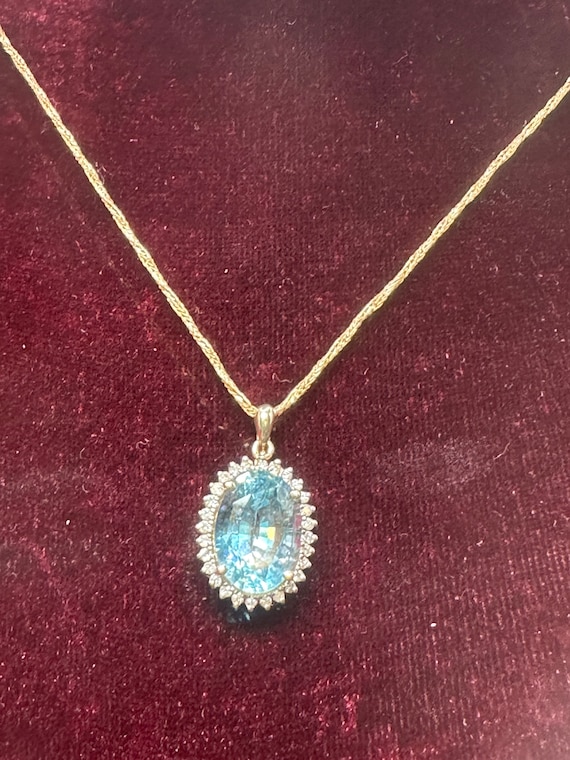 14K Yellow Gold Blue Topaz and Diamond Pendant and