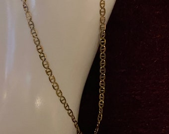 May include: A gold mariner chain necklace with a lobster clasp.