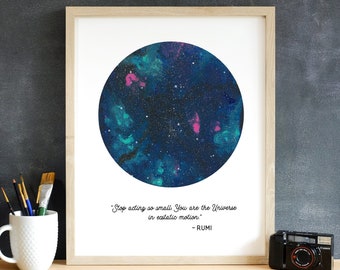 May include: A framed print with a watercolor painting of a galaxy in shades of blue, green, and pink. The quote "Stop acting so small. You are the Universe in ecstatic motion." by Rumi is printed below the painting.