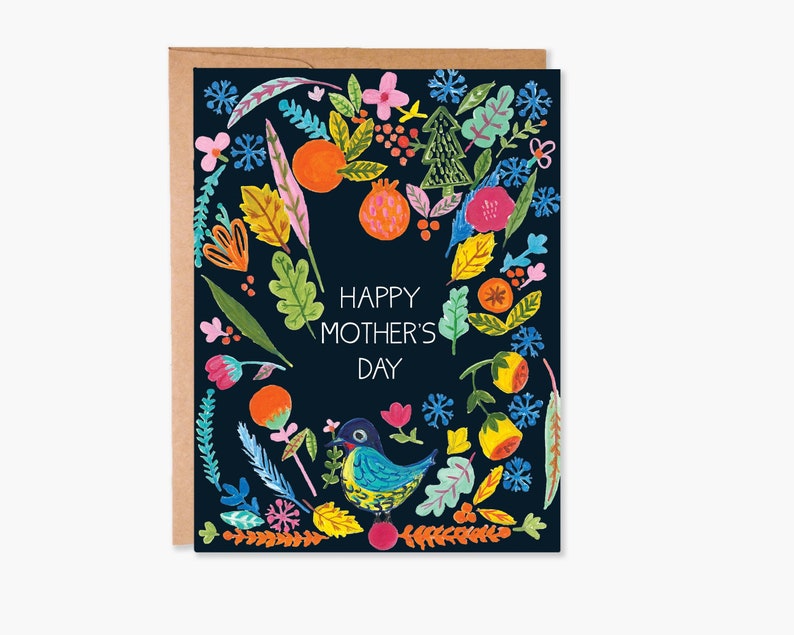 May include: A colorful card with a blue background and a floral border. The card says "Happy Mother's Day" and features a small bird in the center.