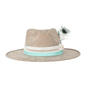 May include: A light gray felt fedora hat with a white and light blue trim. The hat has a peacock feather accent.