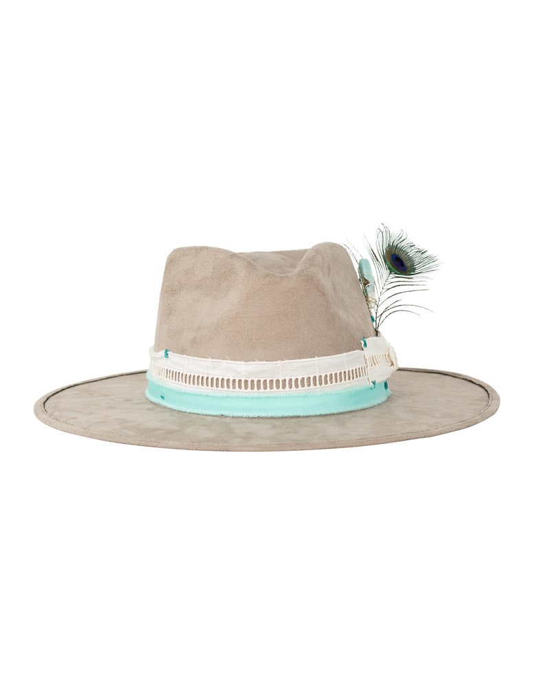 May include: A light gray felt fedora hat with a white and light blue trim. The hat has a peacock feather accent.