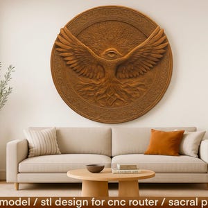 May include: A large, circular, wooden wall panel featuring a detailed relief carving of a stylized bird with outstretched wings, an eye, and a tree design. The panel is brown and mounted above a beige sofa. The text at the bottom reads "3d model / stl design for cnc router / sacral panel."
