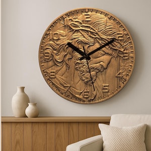 May include: A round wooden wall clock with a detailed relief carving of a religious figure. The clock features black hands and numerals around the edge. The clock is mounted on a light-colored wall.