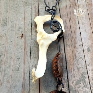 Post Apocalyptic Bone Necklace with bottlecap Side Hip 1