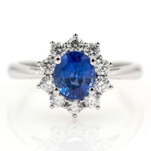 18k/750 white gold ring with a 1.34 ct. blue sapphire and 0.45 ct. diamonds. With IGE certification and HRD jewelry report.