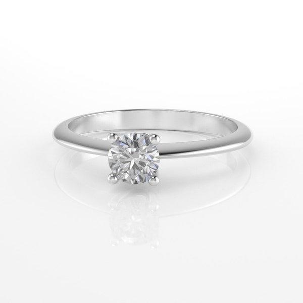 Custom made 18k gold solitaire ring with IGI certified natural diamond.
