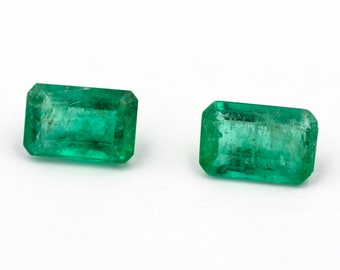 Pair of natural emeralds, rectangular emerald cut. - Weight: 1.35 ct.