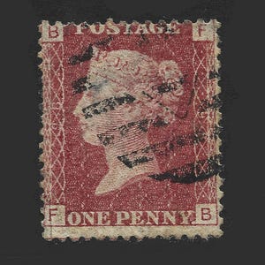 1864 Victoria penny red plate 98 in average used condition.  There are 151 different plate numbers to collect. Collect british stamps.