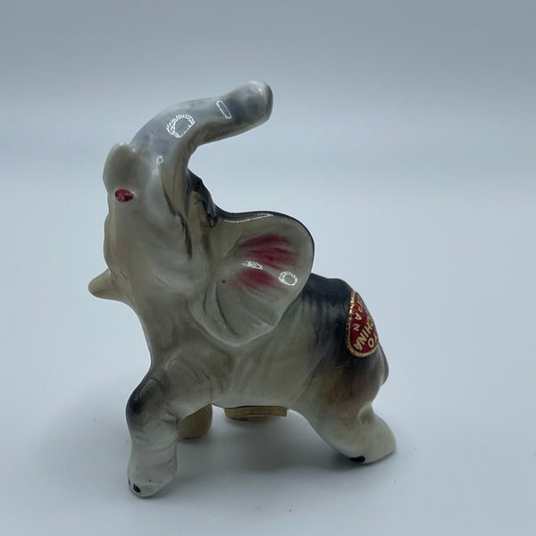 Vintage miniature Bone China elephant Salt Shaker.  Trunk up!