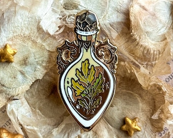 ARTEMISIA LEAF POTION. enamel pin. Gold finish. Hard enamel. Dark academia. bookish pins. witchy vibes. Retro. Vintage. Pin display.